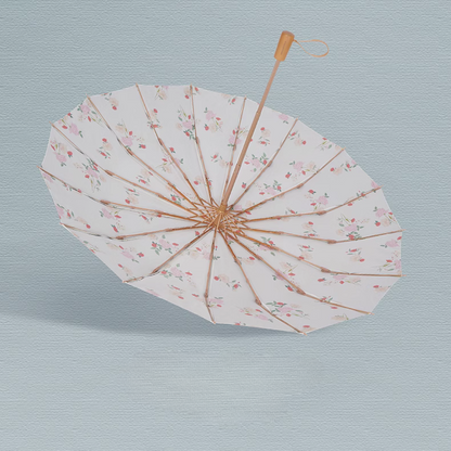 ピンクと赤の花柄の3段折りたたみ傘（晴雨兼用傘）16本骨 二枚生地